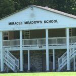 Miracle Meadows School building, symbolizing the $100M abuse case settlement.