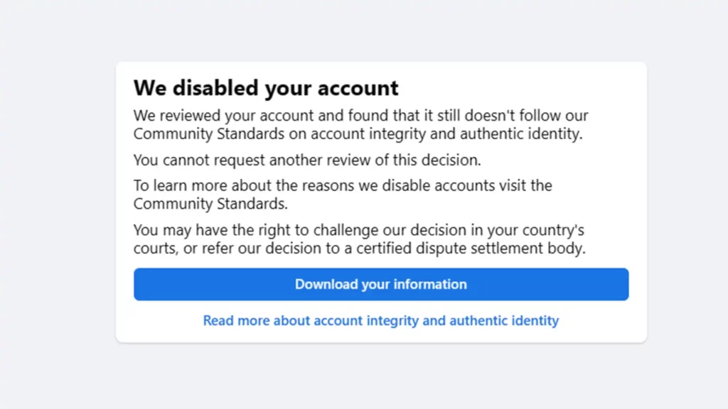 Notification from Facebook stating 'We disabled your account' with details on the lack of compliance with Community Standards and no further review available."
